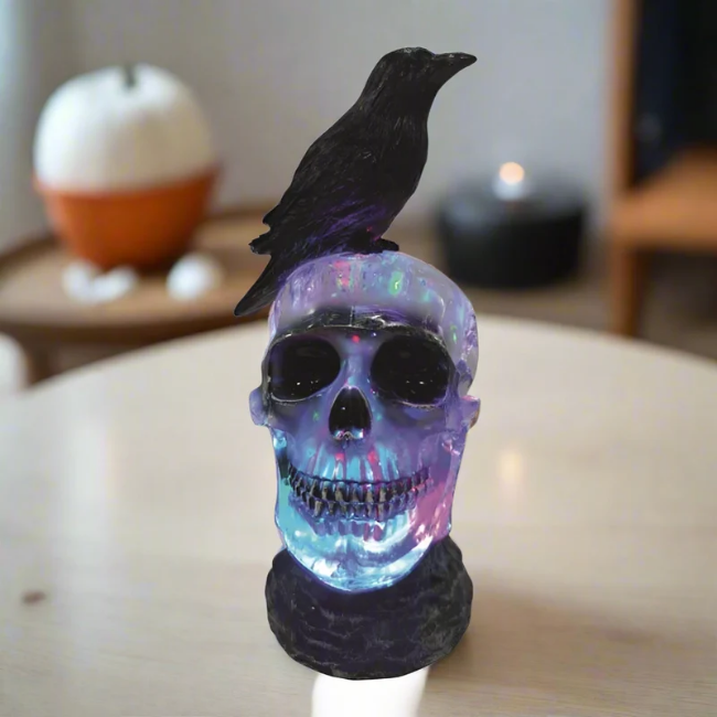 LED SKULL AND RAVEN SPINNER 23.5CM
